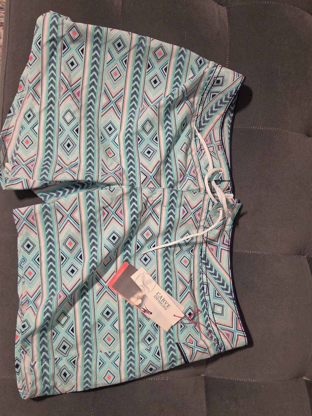 Carve Designs Aqua Geo Stripe Swim Shorts with Coral Accents